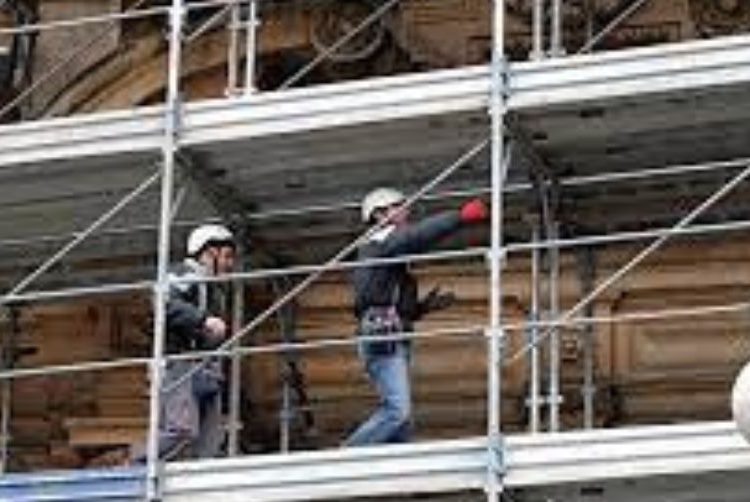 operai al lavoro